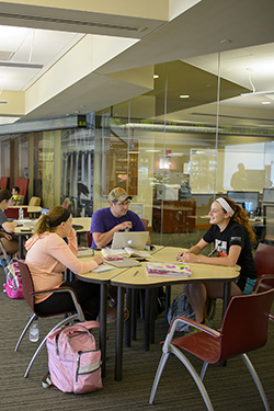 photo of students working together at a table