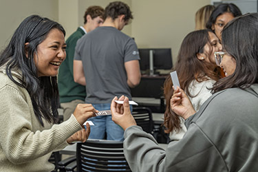 photo of students doing an activity in class