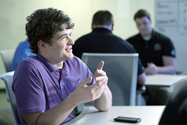 photo of students working together at a table